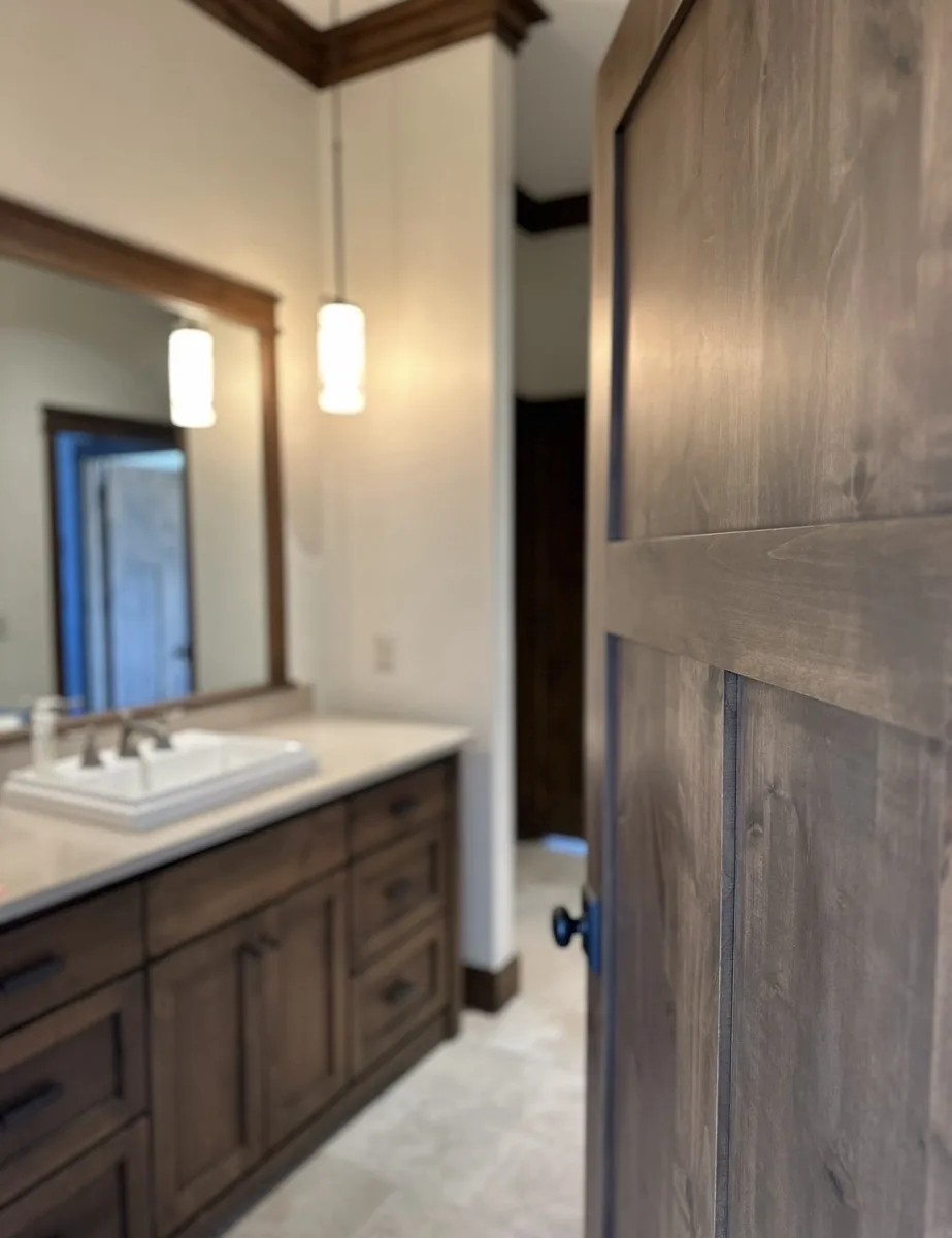 Bathroom vanity with pendant lighting in a home