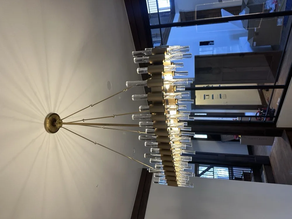 Crystal drop chandelier installation in an Oklahoma City home