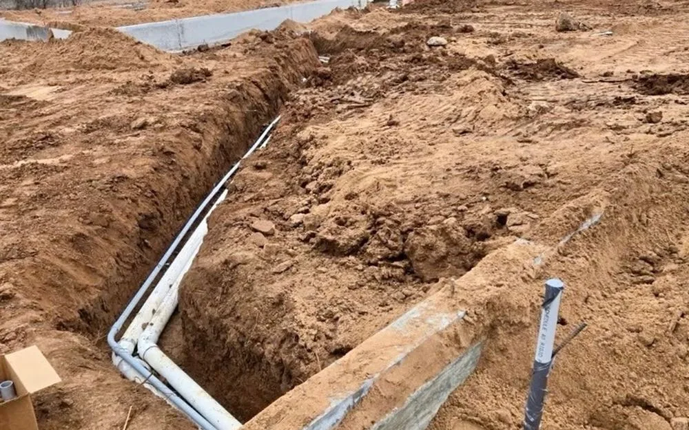 Electrical conduit run in a foundation trench on an Oklahoma City new-construction site