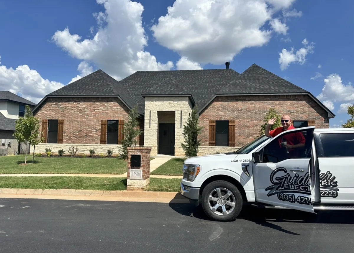Grider Electric truck at a finished brick home in OKC