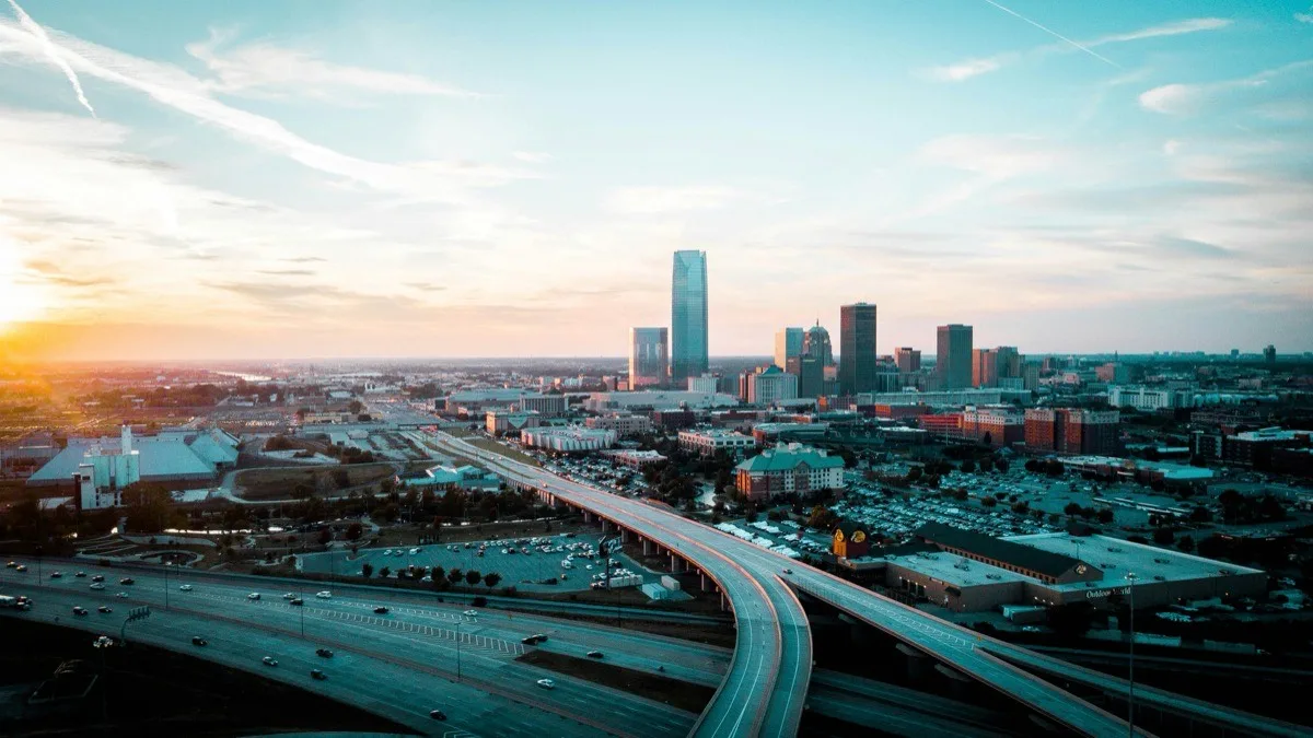 Aerial view of the Oklahoma City metro skyline at sunset